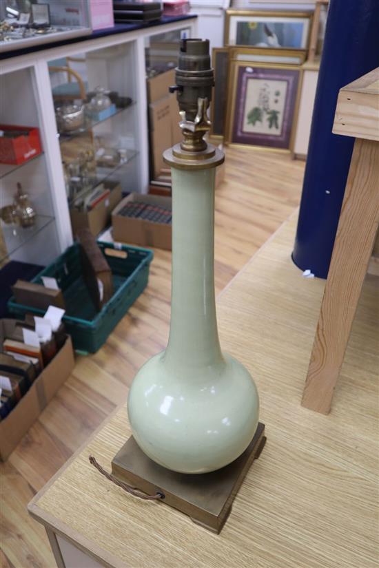 A French duck egg blue porcelain bottle neck vase converted to a table lamp, brass plinth, c.1970, height 46cm. Provenance: The Late Si